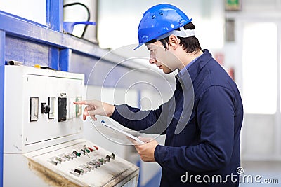 Young professional electrician at work Stock Photo