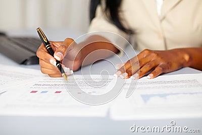 Young professional working on documents Stock Photo