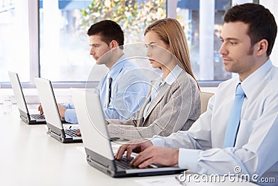 Young professionals busy by working Stock Photo