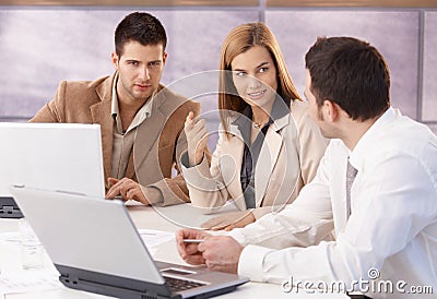 Young professionals teamworking in meeting room Stock Photo