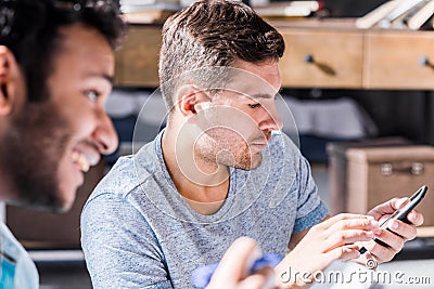 Young professionals working in small business office Stock Photo