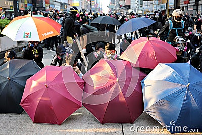 Young protesters, Protest hong kong 2019, police running against protester Editorial Stock Photo