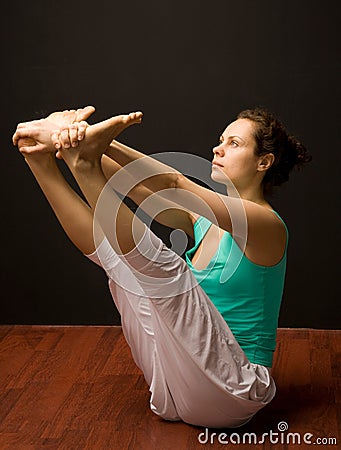 Young real yoga instructor practicing Stock Photo