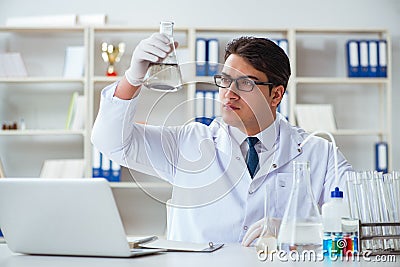 Young researcher scientist doing a water test contamination expe Stock Photo