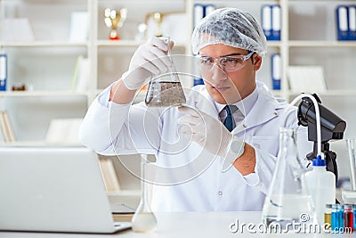 Young researcher scientist doing a water test contamination expe Stock Photo