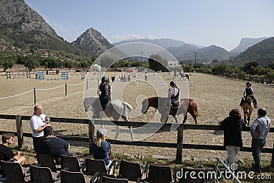 Young riders and public on a local horse competition in mallorca Editorial Stock Photo