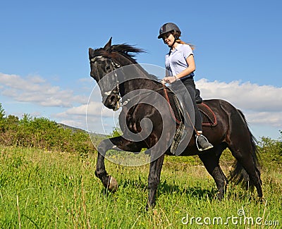 Young riding girl Stock Photo