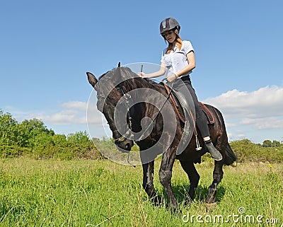 Young riding girl Stock Photo