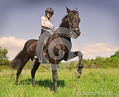 Young riding girl Stock Photo