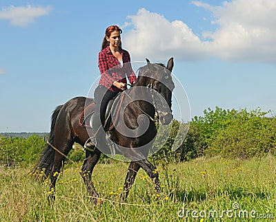 Young riding girl Stock Photo