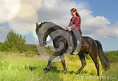 Young riding girl Stock Photo