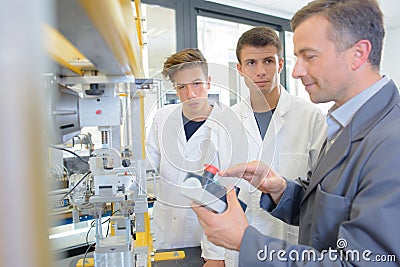 The young robotic engineers Stock Photo