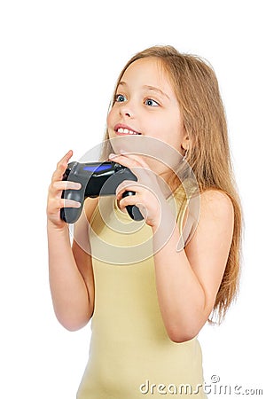 Young scared cute girl with grey blue eyes and long light brown hair plays computer game with joystick Stock Photo