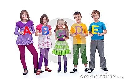 Young school children holding A B C letters Stock Photo