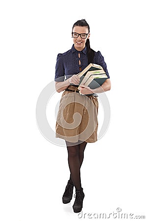 Young school-marm with books smiling Stock Photo