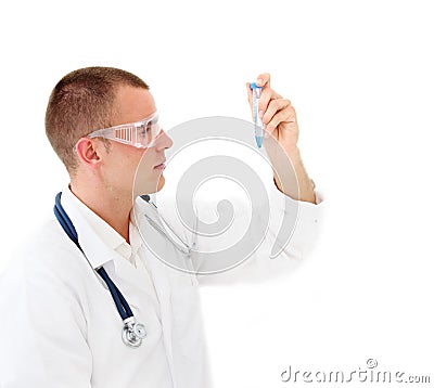 Young scientist checking a test tube Stock Photo