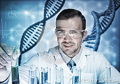 Young scientist mixing reagents in glass flask in clinical laboratory Stock Photo