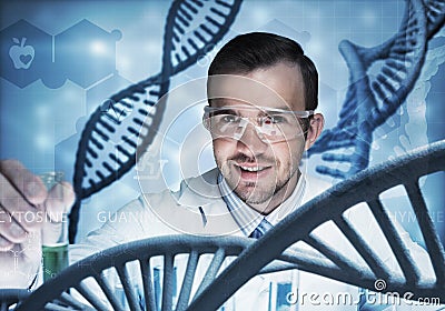 Young scientist mixing reagents in glass flask in clinical laboratory Stock Photo