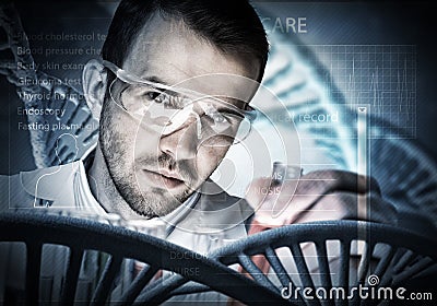 Young scientist mixing reagents in glass flask in clinical laboratory Stock Photo