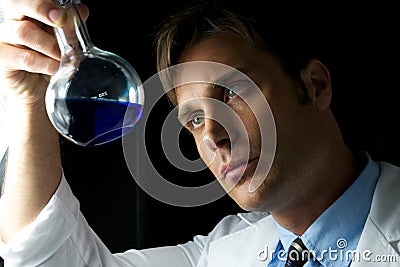 Young Scientist Performing Experiment Stock Photo