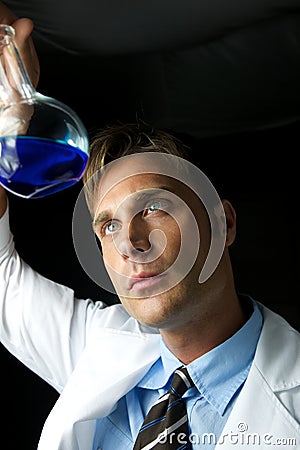 Young Scientist Performing Experiment Stock Photo