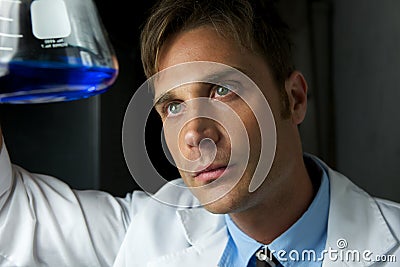 Young Scientist Performing Experiment Stock Photo