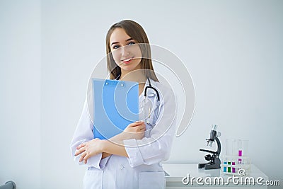 Young scientist pipetting in life science laboratory. Stock Photo