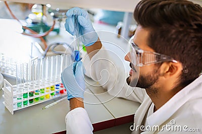 Young scientist student man working at the laboratory Stock Photo