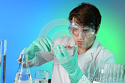 Young Scientist Testing Meat Stock Photo