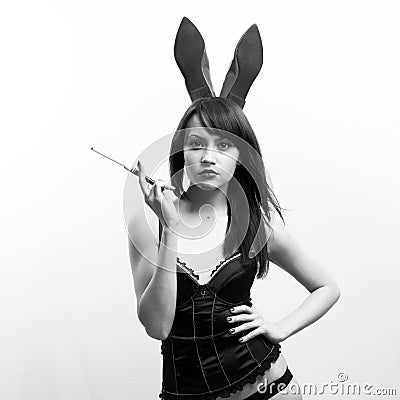 Young seductive woman with rabbit ears Stock Photo