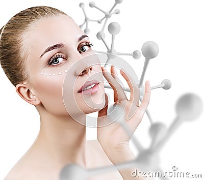 Young sensual woman with big white molecule chain. Stock Photo