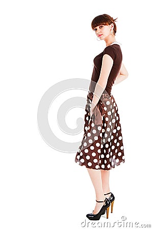 Young sensuality beautiful girl in spotted skirt Stock Photo