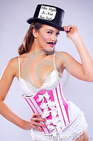 Young Sensuous Woman In Corset And Moustache Stock Photo