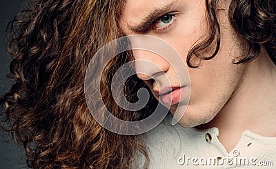 Young serious man. Close up. Man with confident face and brutal style. Stylish young man. Portrait casual serious man. Stock Photo