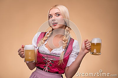 Young blonde wearing dirndl Stock Photo