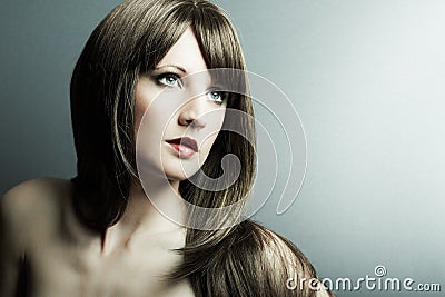 The young girl in chestnut-coloured wig Stock Photo