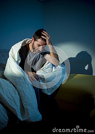 Young sick looking man suffering mental disorder or depression Stock Photo