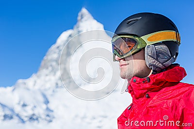 Young skier ready for a new day on the ski slopes. Stock Photo