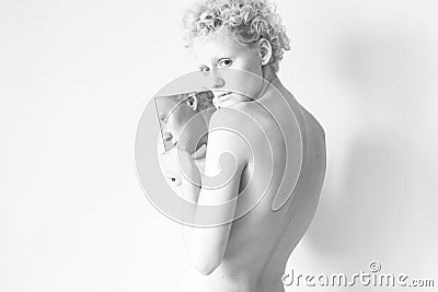 Young skinny girl and mirror. Stock Photo