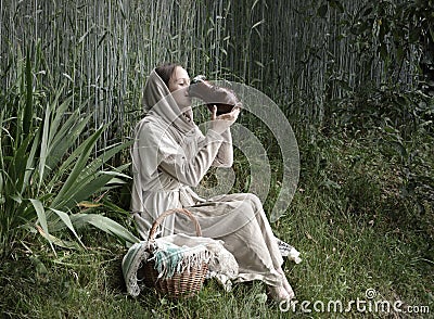 Young slave woman in the garden Stock Photo