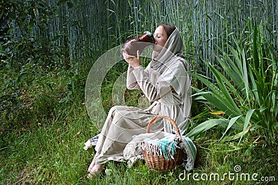 Young slave woman in the garden Stock Photo