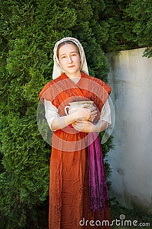 Young slave woman in the garden Stock Photo