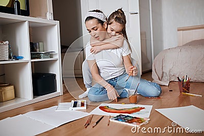 Young slim good looking woman holding a brush Stock Photo