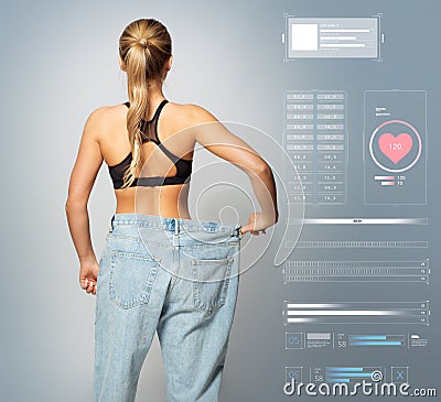 Young slim sporty woman in large size pants Stock Photo