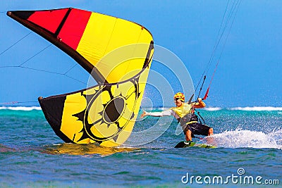 Young smiing kitesurfer on sea background Extreme Sport Kitesur Stock Photo