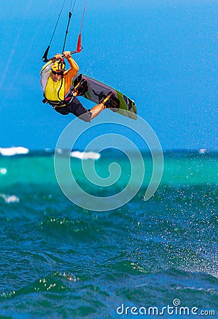 Young smiing kitesurfer on sea background Extreme Sport Kitesur Stock Photo