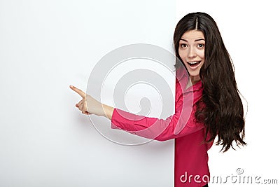 Young smile woman pointing at a blank board Stock Photo