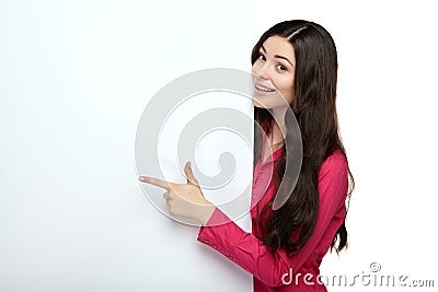 Young smile woman pointing at a blank board Stock Photo