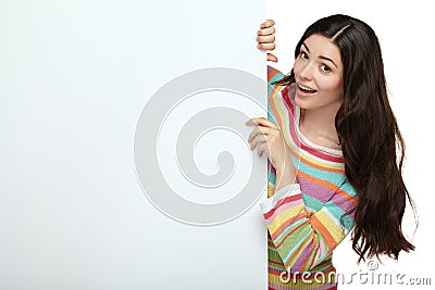 Young smile woman pointing at a blank board Stock Photo