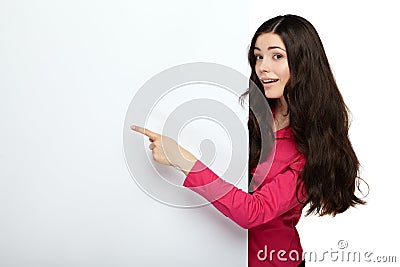 Young smile woman pointing at a blank board Stock Photo